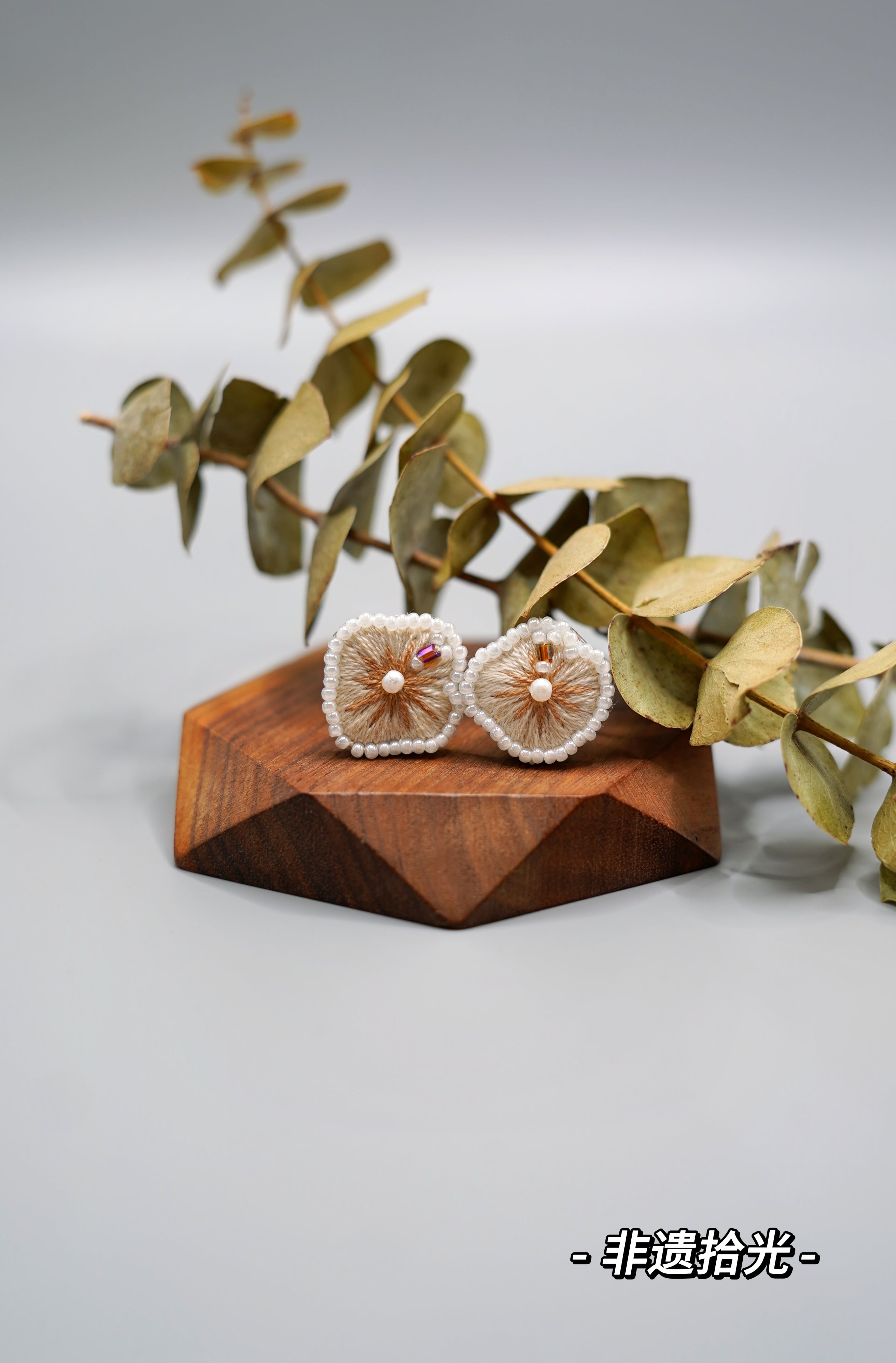 Exquisite and small hand-embroidered earrings